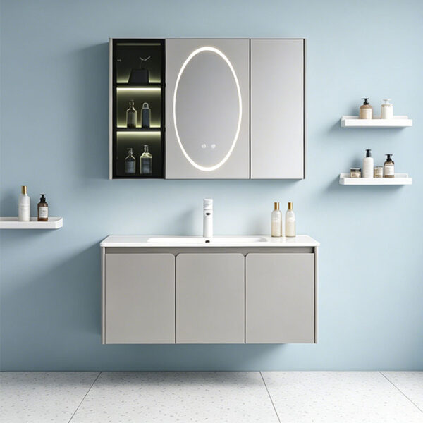 The bathroom vanity features a ceramic integrated basin for washing hands and face, and a solid wood, cream-colored finish.