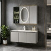 The bathroom vanity features a ceramic integrated basin for washing hands and face, and a solid wood, cream-colored finish.