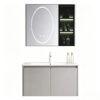 The bathroom vanity features a ceramic integrated basin for washing hands and face, and a solid wood, cream-colored finish.