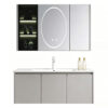 The bathroom vanity features a ceramic integrated basin for washing hands and face, and a solid wood, cream-colored finish.